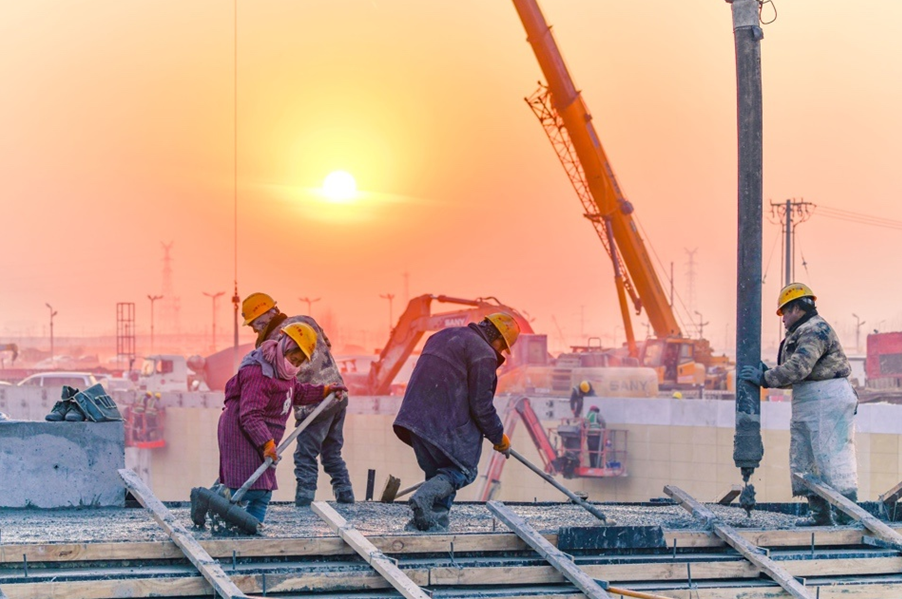 construction workers busy with the final construction of the west square of the Xiong’an.png construction workers busy with the final construction of the west square of the Xiong’an.png